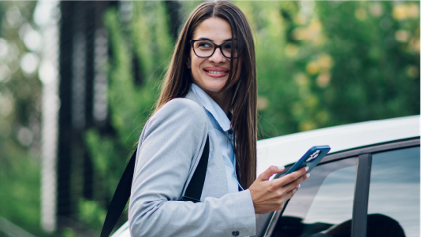 Corporate_Lady_Walking_To_Leased_Car.png