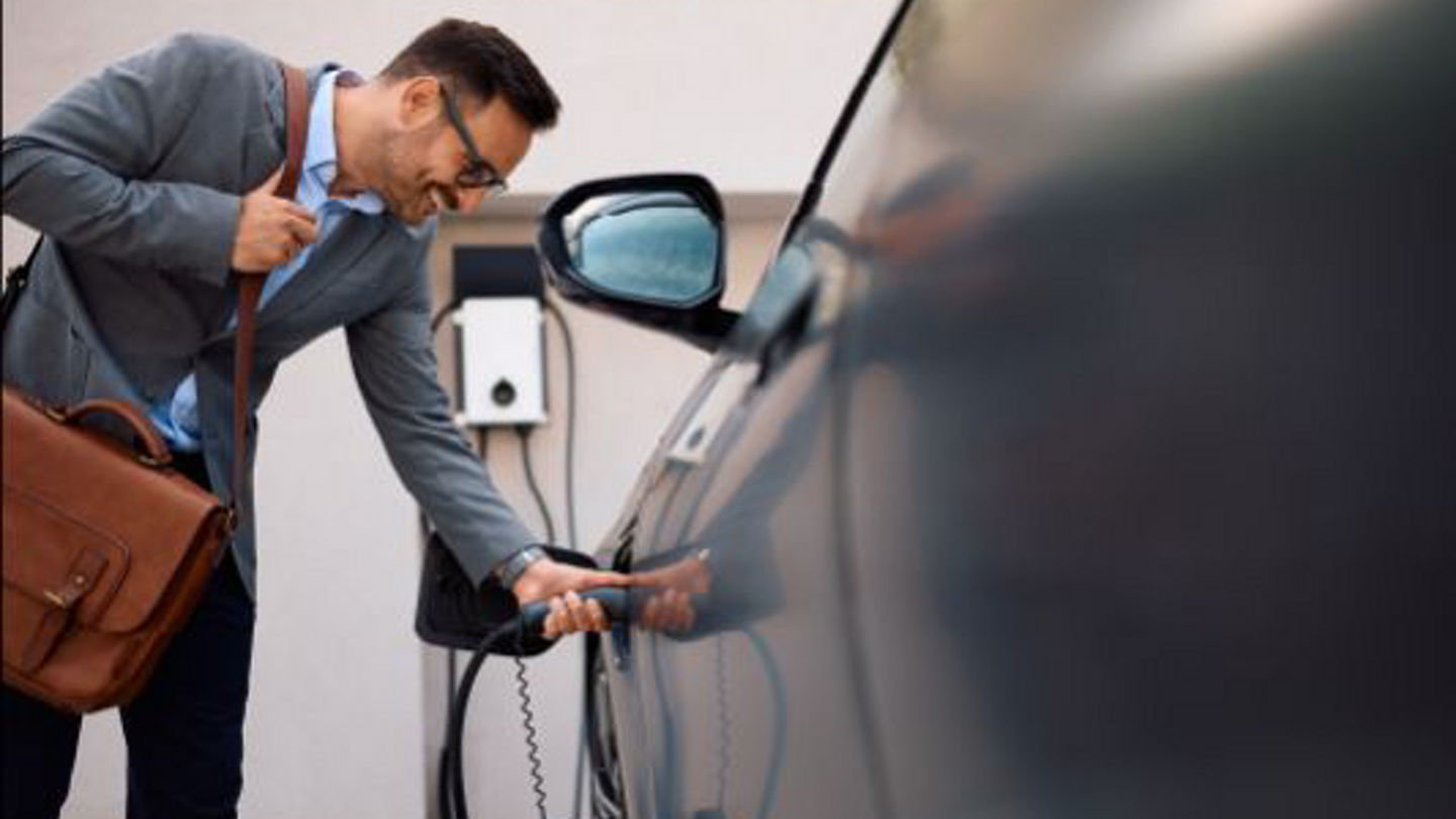 EV_Customer_Charging_Car.jpg