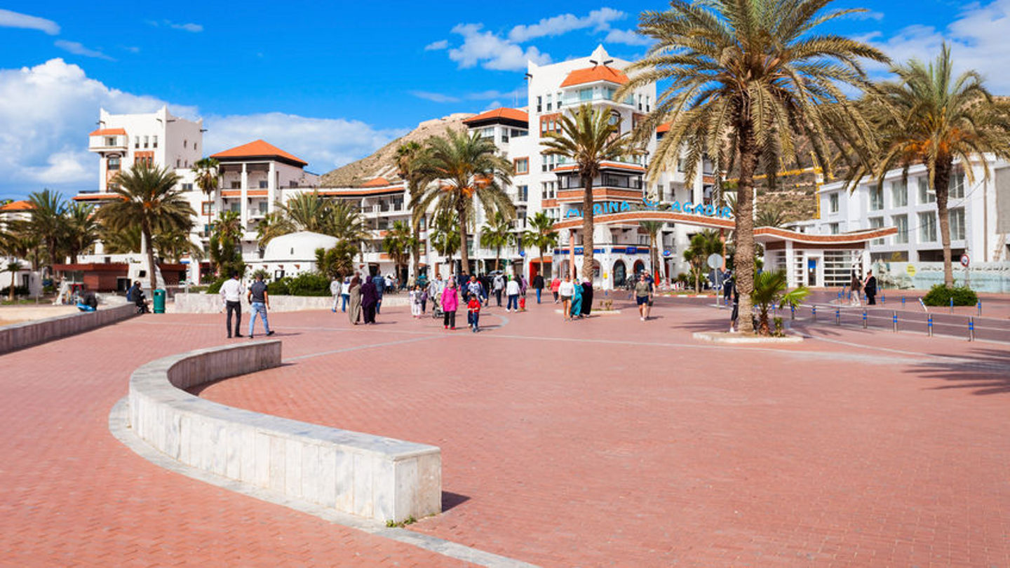 63244490 - agadir, morocco - february 21, 2016: agadir seafront promenade in morocco. agadir is a major city in morocco located on the shore of the atlantic ocean.