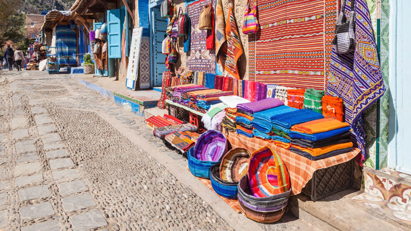 63244278 - chefchaouen, morocco - march 01, 2016: traditional moroccan textile on the market in chefchaouen, morocco.