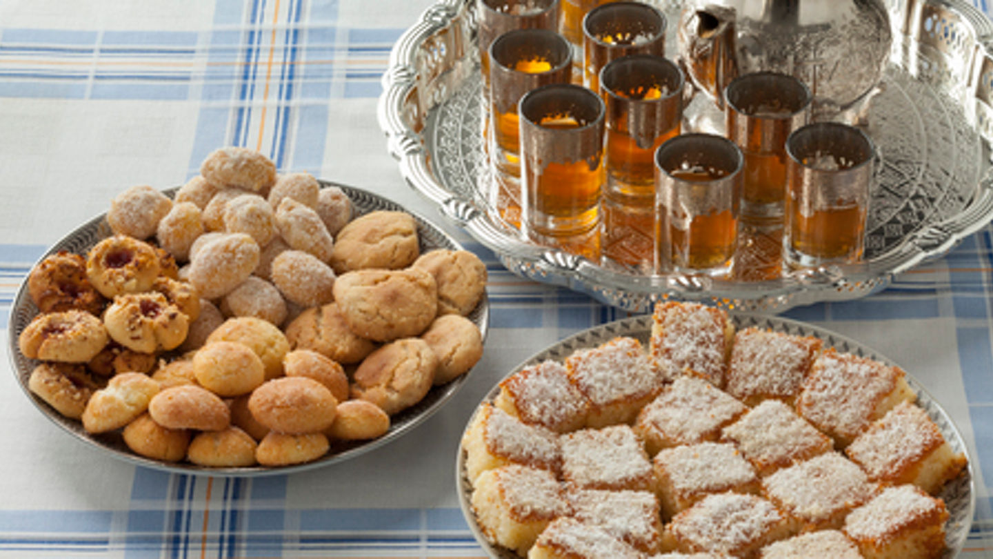 77054052 - traditional variety of festive moroccan cookies and mint tea