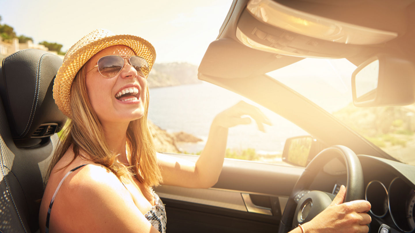 avis-lifestyle-woman-in-convertible-900x700.jpg