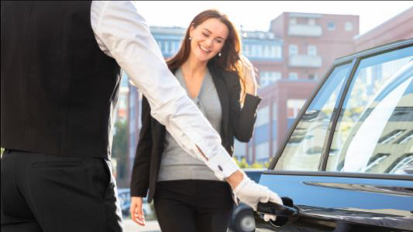 chauffeur_gloved_opening_door.jpg