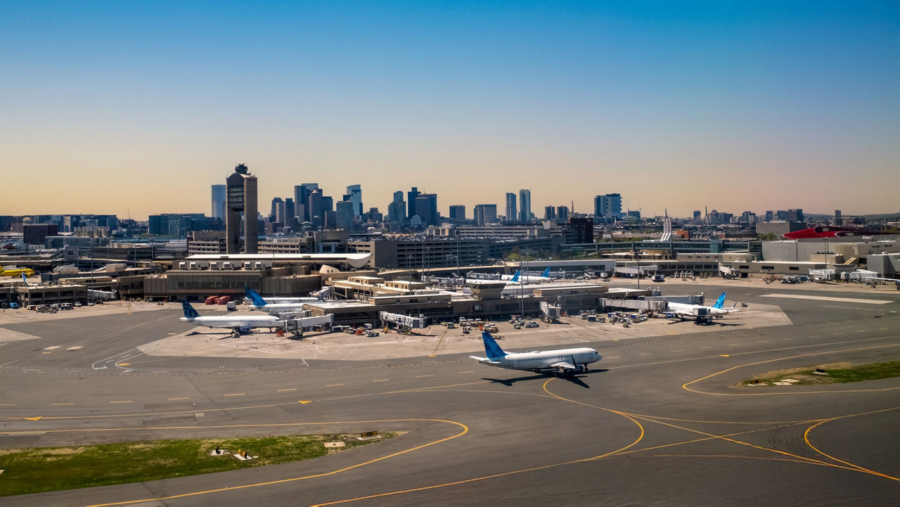 View of Boston Logan airport with Boston in the background